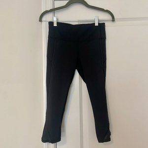lululemon Black Capri Leggings with Cross-stitching and Sheer Calf Details XS
